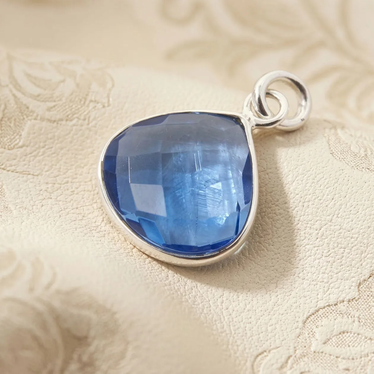 Silver Blue Topaz December Birthstone Pendant: the shop's own photo