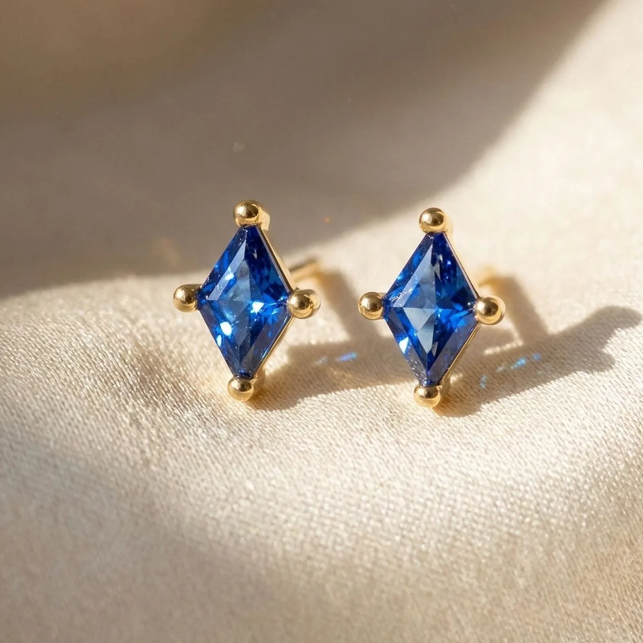 Tiny Sapphire Stud September Birthstone Earrings: the shop's own photo