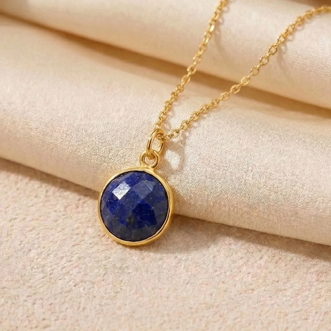 Gold Plated Round Blue Sapphire September Birthstone Charm Necklace: the shop's own photo
