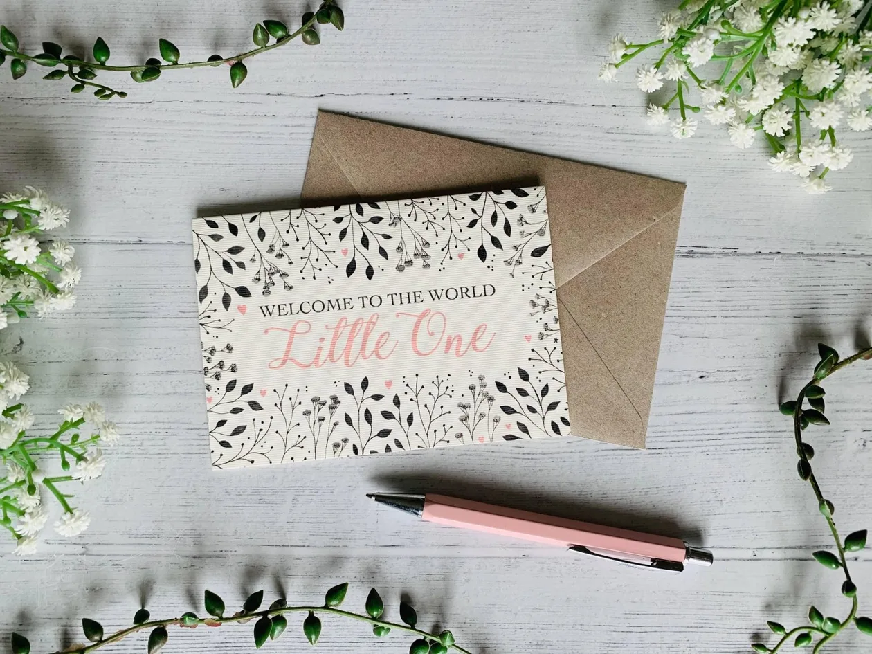 Welcome to the World Little One (Pink) Greeting Card: the shop's own photo