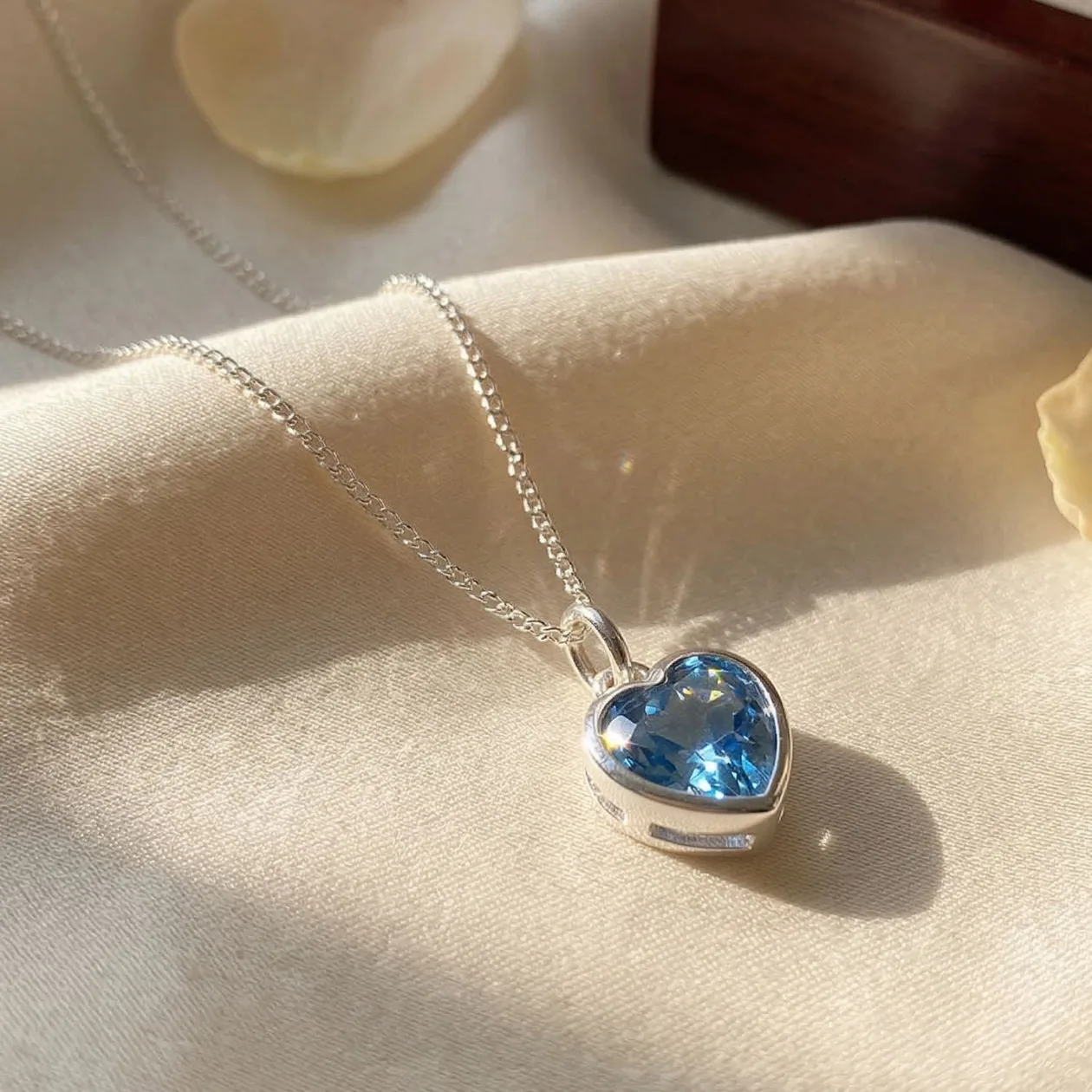 Mini Heart Blue Topaz December Birthstone Necklace: the shop's own photo