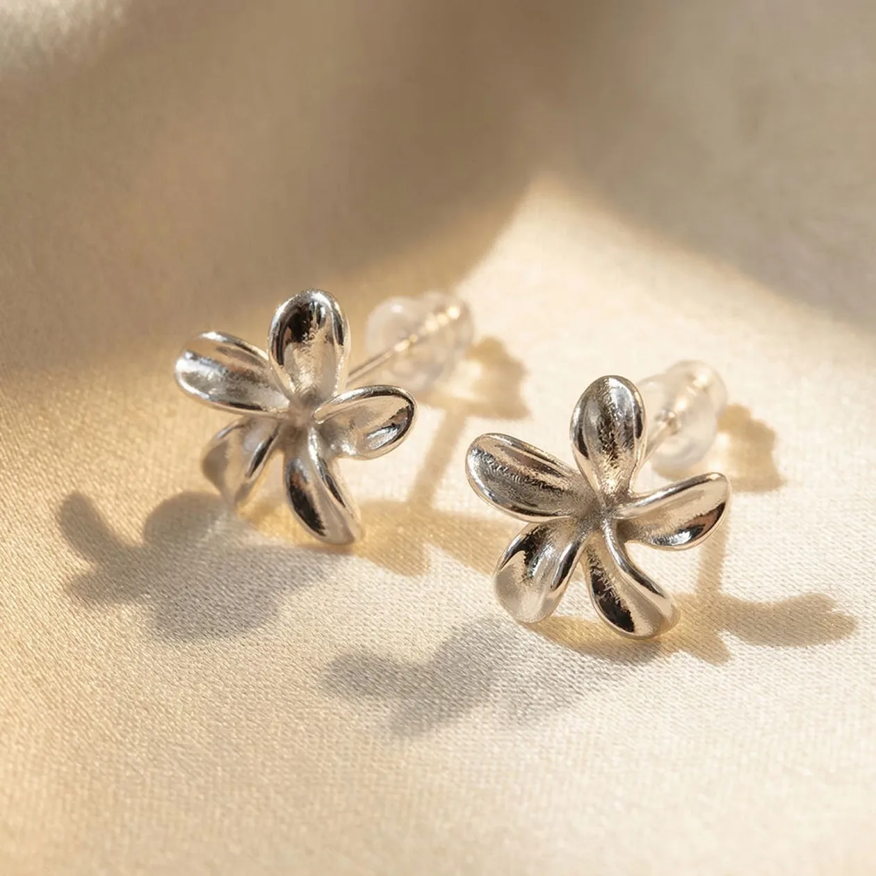 Dainty Mini Tiny Flower Stud Sterling Silver Earrings: the shop's own photo