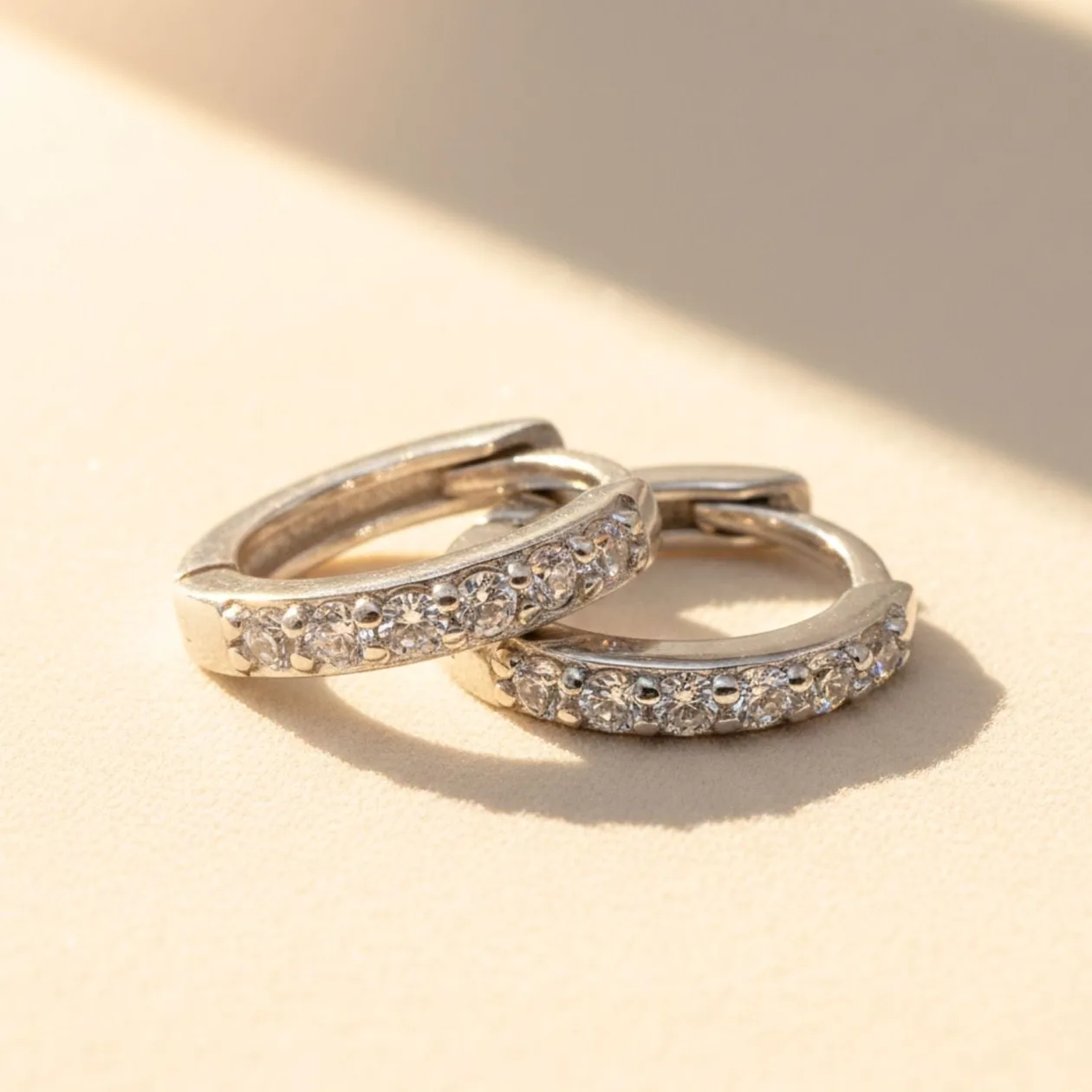 Diamond April Birthstone Small Silver Huggie Hoops: the shop's own photo