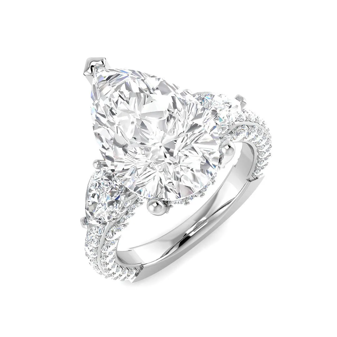 3-Stone Lab Grown Diamond 7.00ct Pear Cut D/VVS Ring - 7.00 Carat / 18k Yellow Gold: the shop's own photo