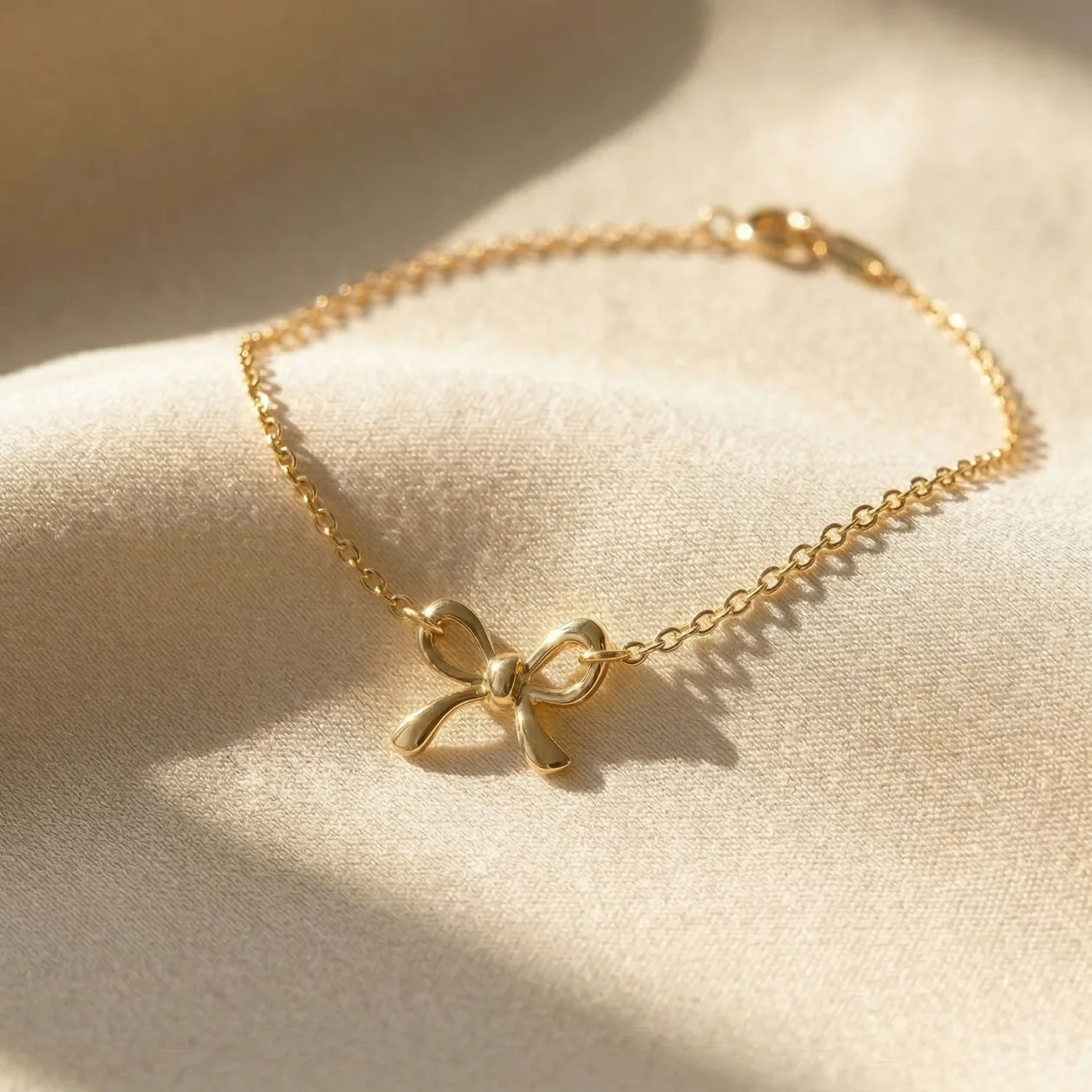 Dainty Bow Tie Bowknot Gold Plated Charm Bracelet: the shop's own photo