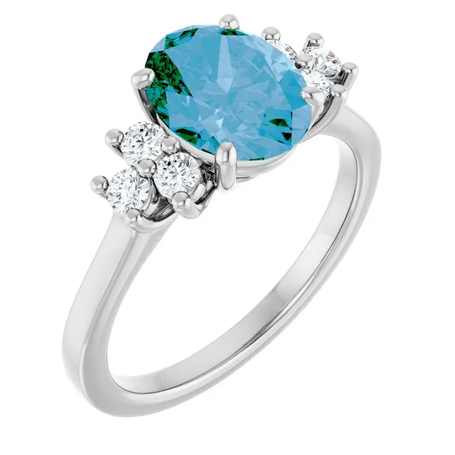 Oval Swiss Blue Topaz Accented Ring with Diamond Accents in Gold - 18k Yellow Gold / 2.20 Carat / Lab-Grown-AAA: the shop's own photo