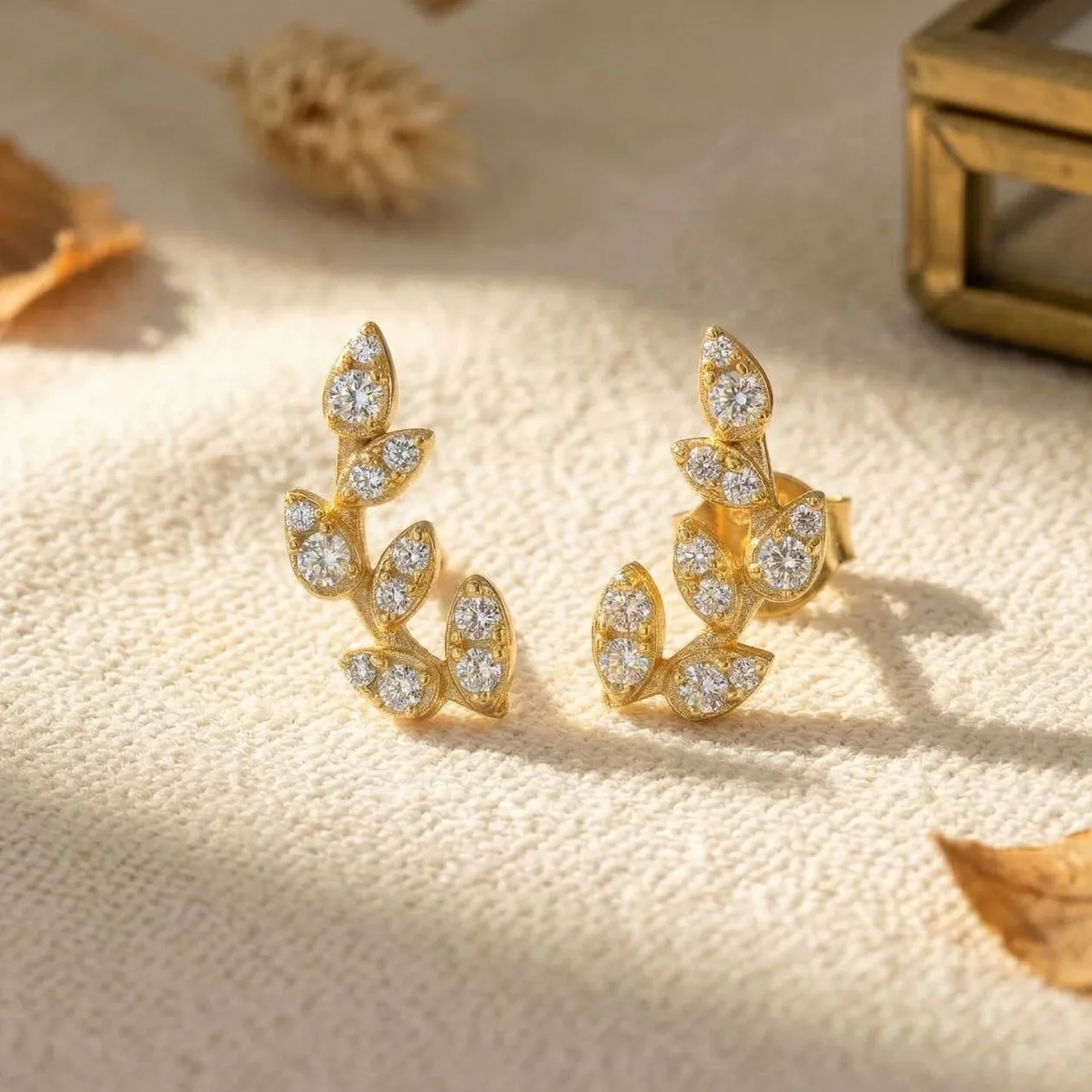 Sparkling Leaf Branch Gold Plated Stud Earrings: the shop's own photo