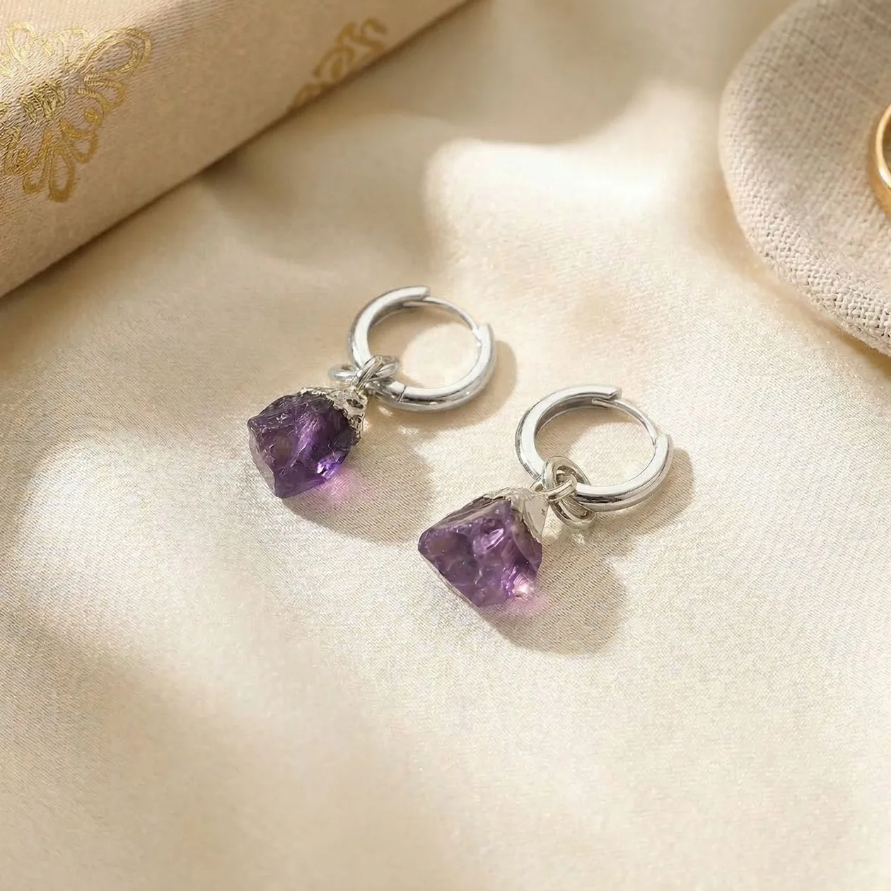 Raw Amethyst February Birthstone Sterling Silver Huggies: the shop's own photo