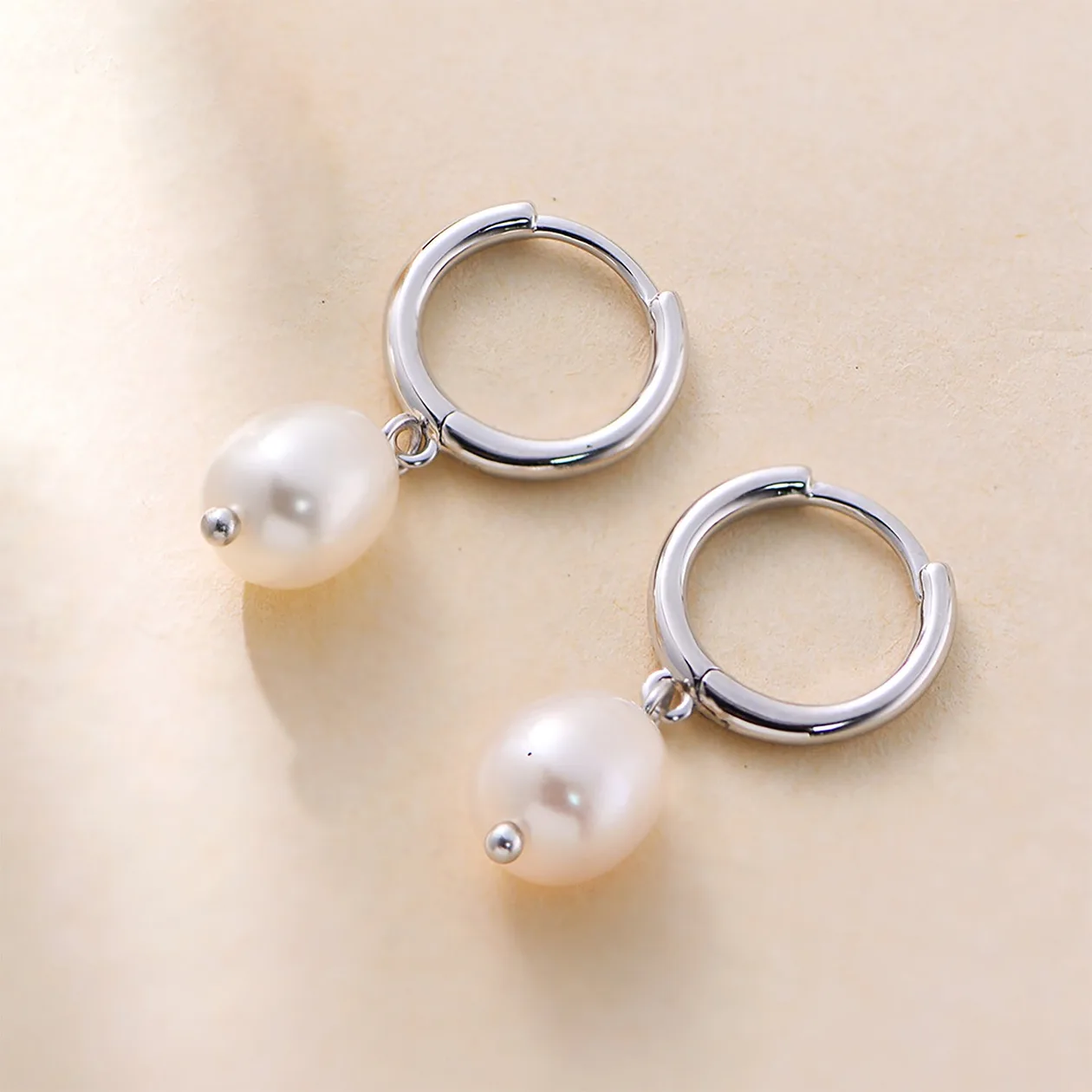 Minimalist Freshwater Pearl Silver Huggie Hoop Earrings: the shop's own photo
