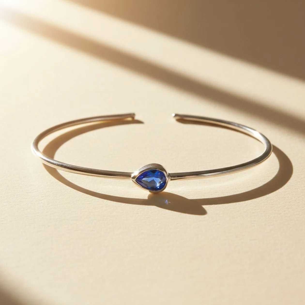 Minimalist Sterling Silver Sapphire September Birthstone Bangle Bracelet: the shop's own photo