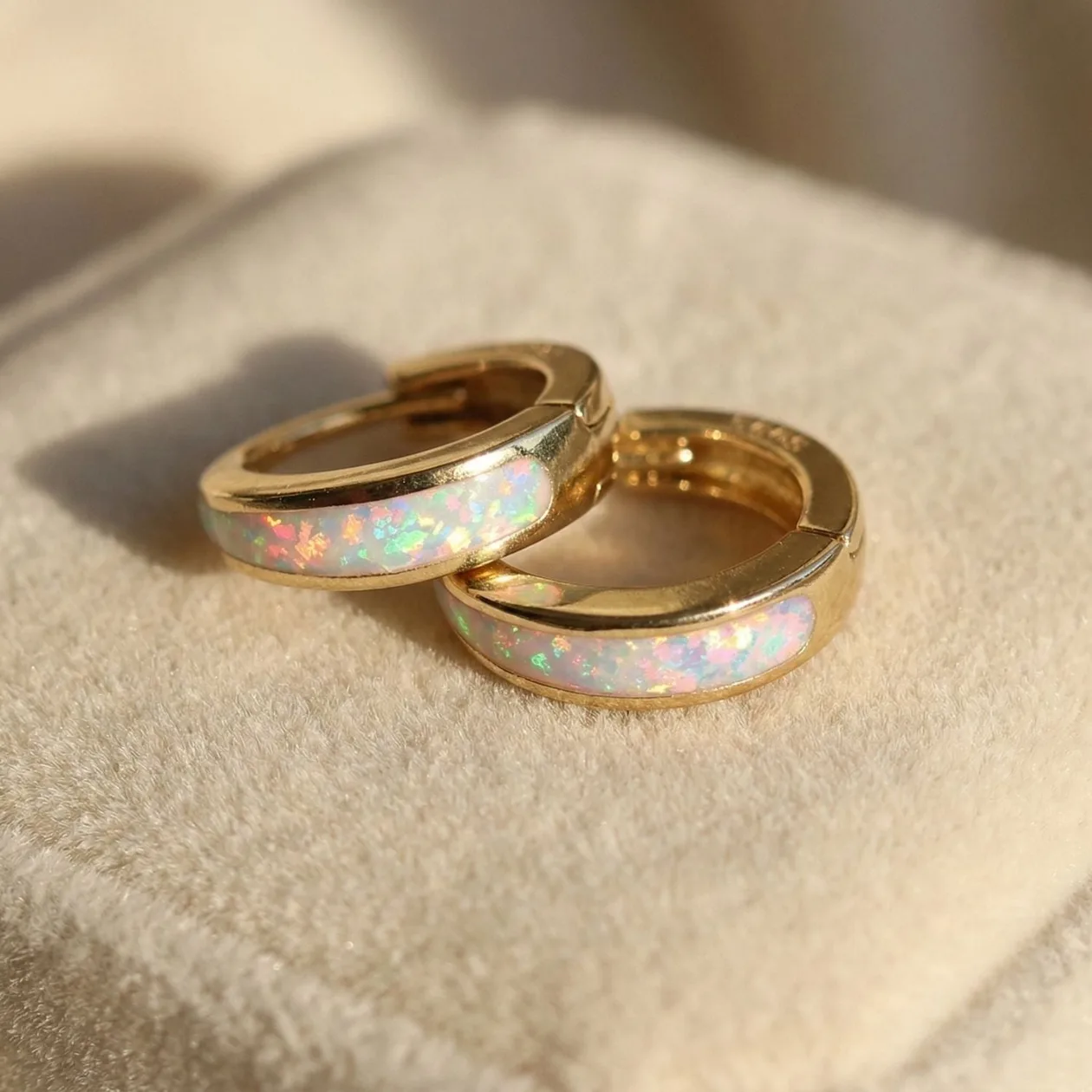 White Opal Tapered Gold Plated Huggie Hoop Earrings: the shop's own photo