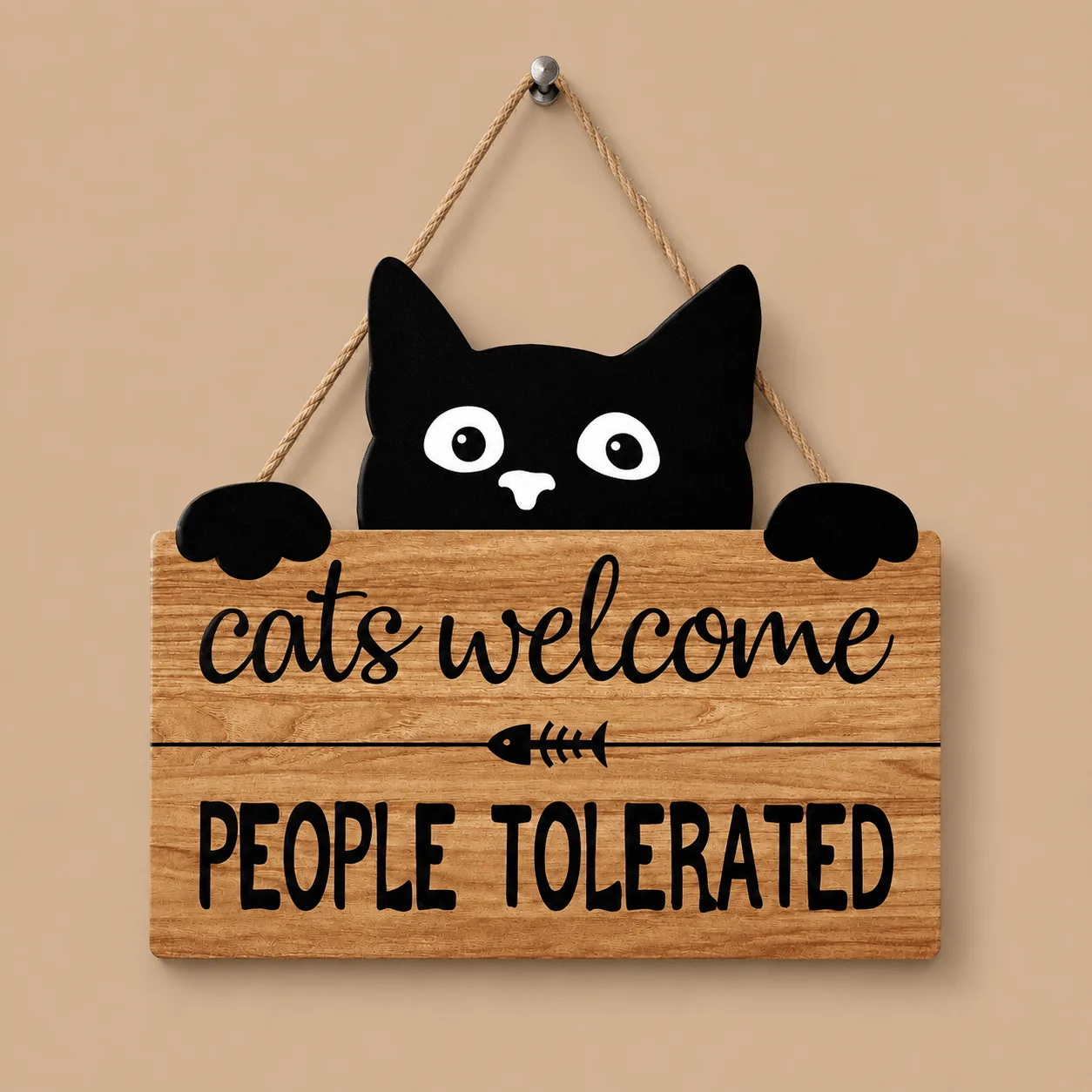 "Cats Welcome, People Tolerated" Plaque: the shop's own photo