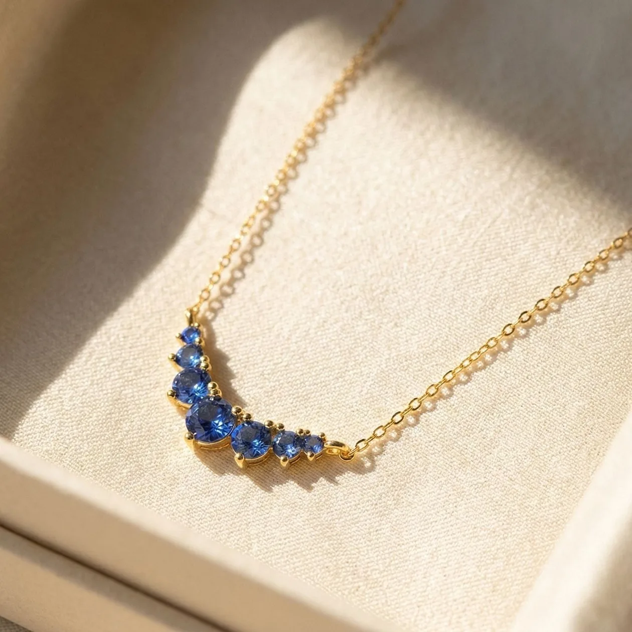 Graduated Round Sapphire Stones Gold Plated Necklace: the shop's own photo