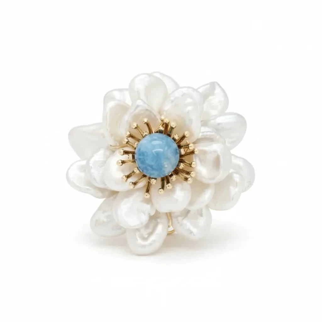 Baroque Pearl Flower Brooch with Blue Stone: the shop's own photo