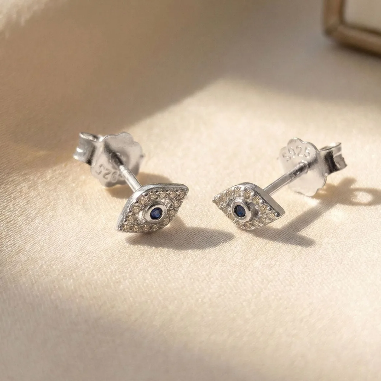 Dainty Evil Eye Silver Minimalist Stud Earrings: the shop's own photo