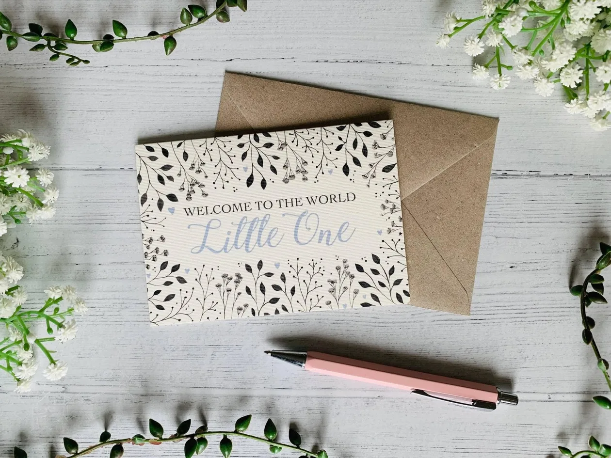 Welcome to the World Little One (Blue) Greeting Card: the shop's own photo