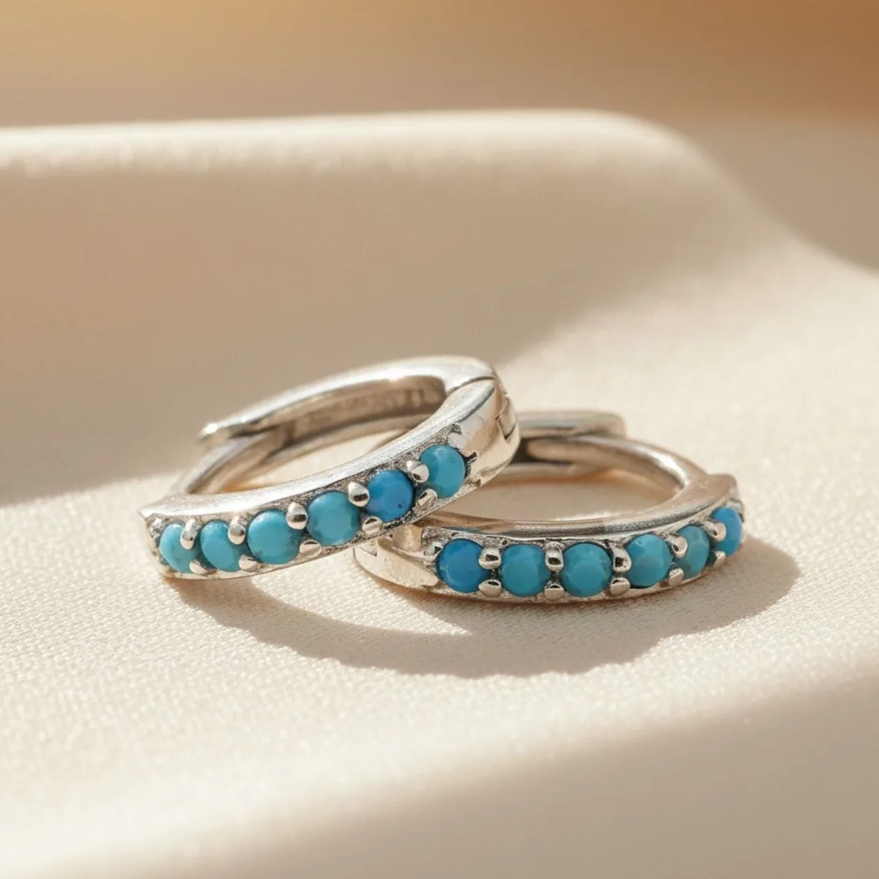 Turquoise December Birthstone Small Silver Huggie Hoops: the shop's own photo