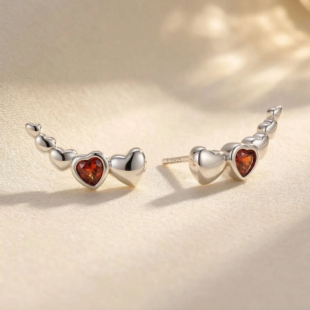 Sterling Silver Dainty Love Heart Stud Earrings: the shop's own photo