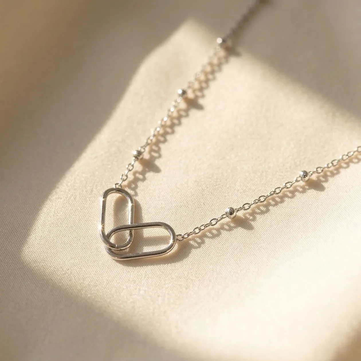 Interlocking Paperclip Infinity Silver Necklace: the shop's own photo