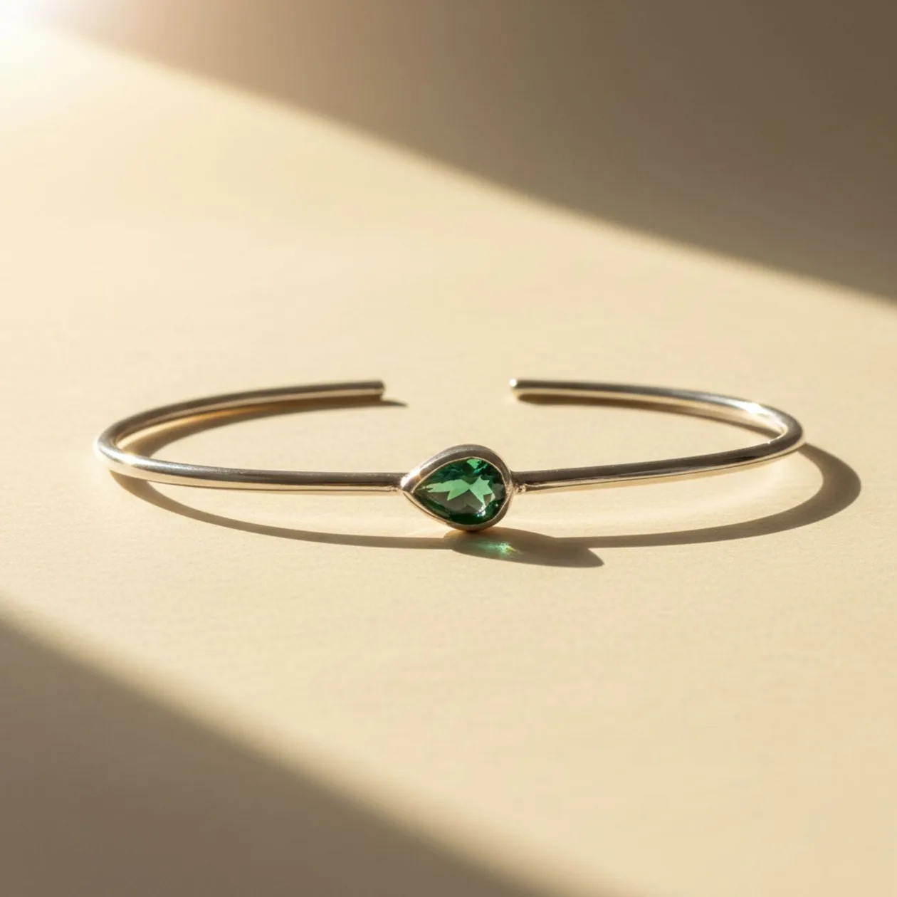 Minimalist Sterling Silver Emerald May Birthstone Bangle Bracelet: the shop's own photo