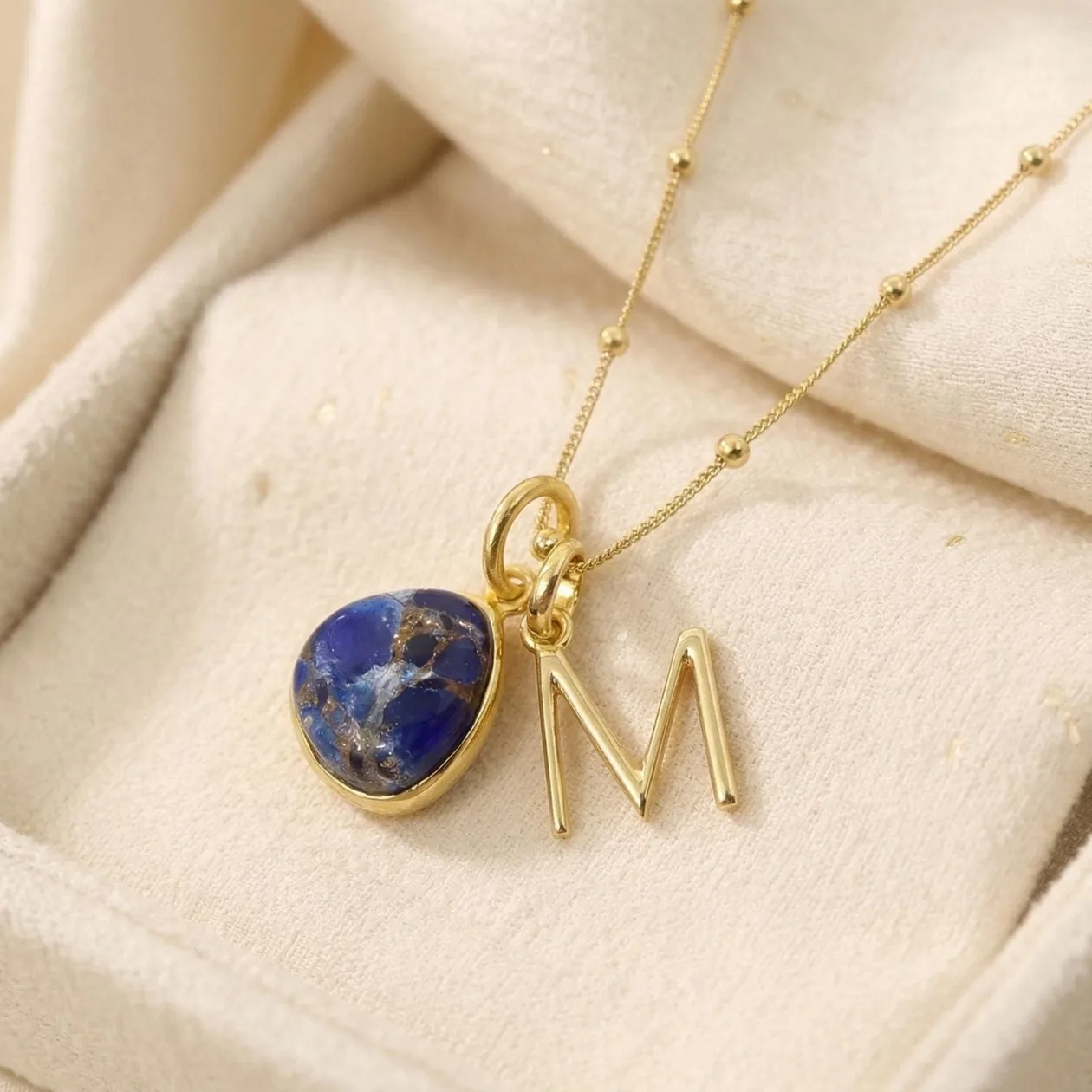 Gold Plated Initial And Sapphire September Birthstone Necklace - V: the shop's own photo