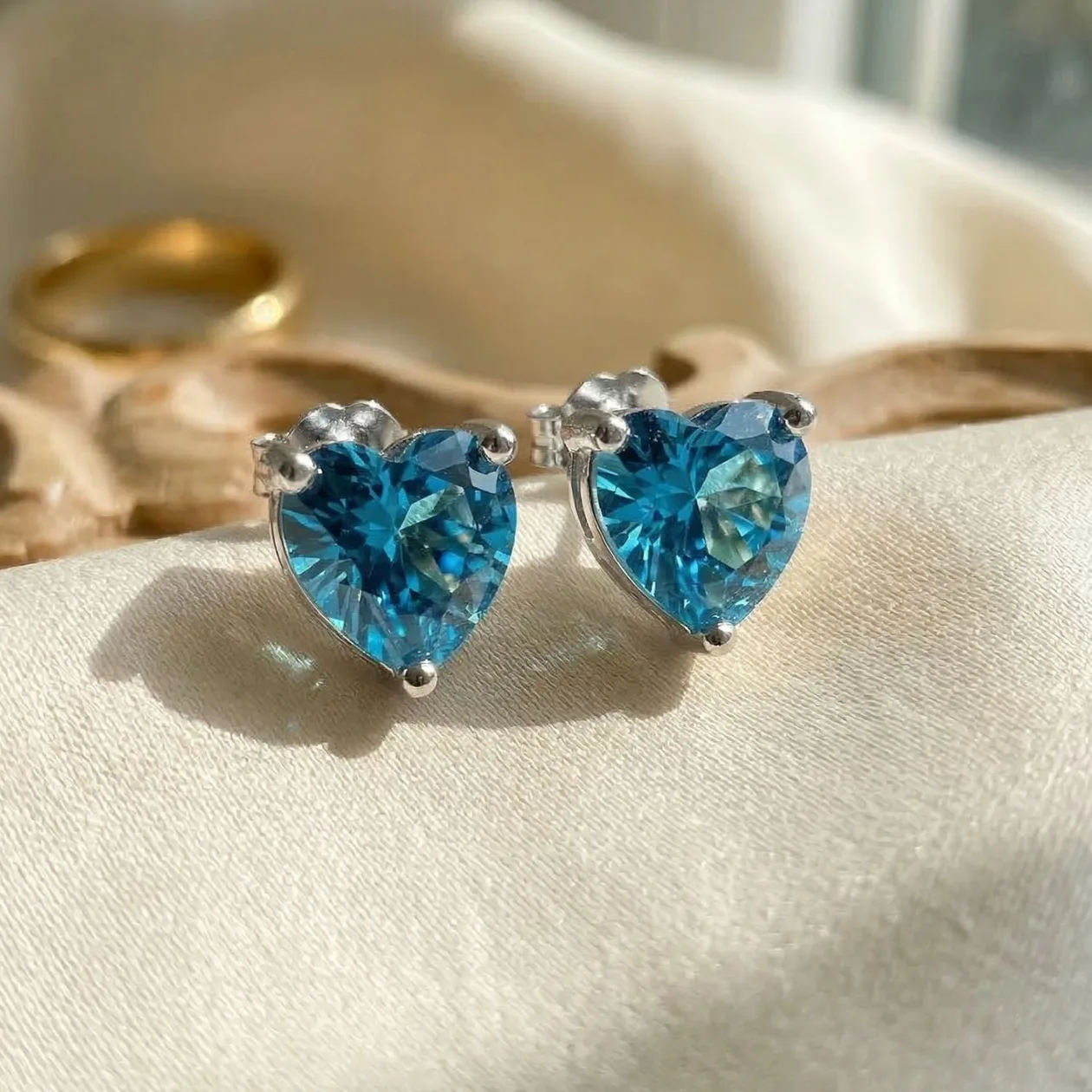 Blue Topaz December Birthstone Heart Sterling Silver Stud Earrings: the shop's own photo