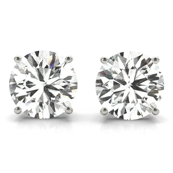 Stud Earrings with Natural Round Diamond Claw Setting - 18k Gold - F-G/VS / 0.20 Carat / 950 Platinum: the shop's own photo