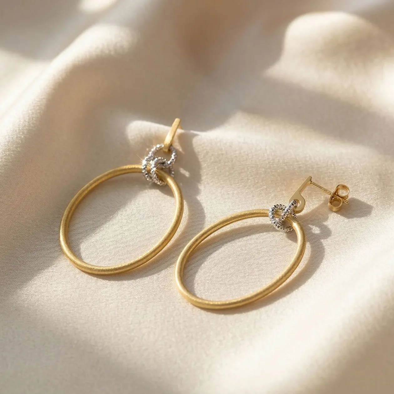 Elegant Two-Tone Diamond Cut Circle Drop Earrings with Gold-Plated Satin Finish: the shop's own photo