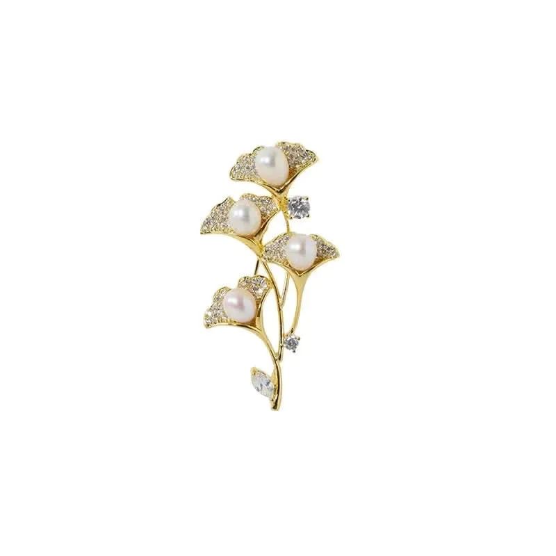 Cedar Leaf Zircon and Freshwater Pearl Brooch: the shop's own photo
