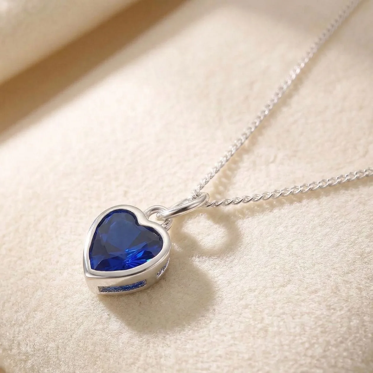 Mini Heart Sapphire September Birthstone Necklace: the shop's own photo