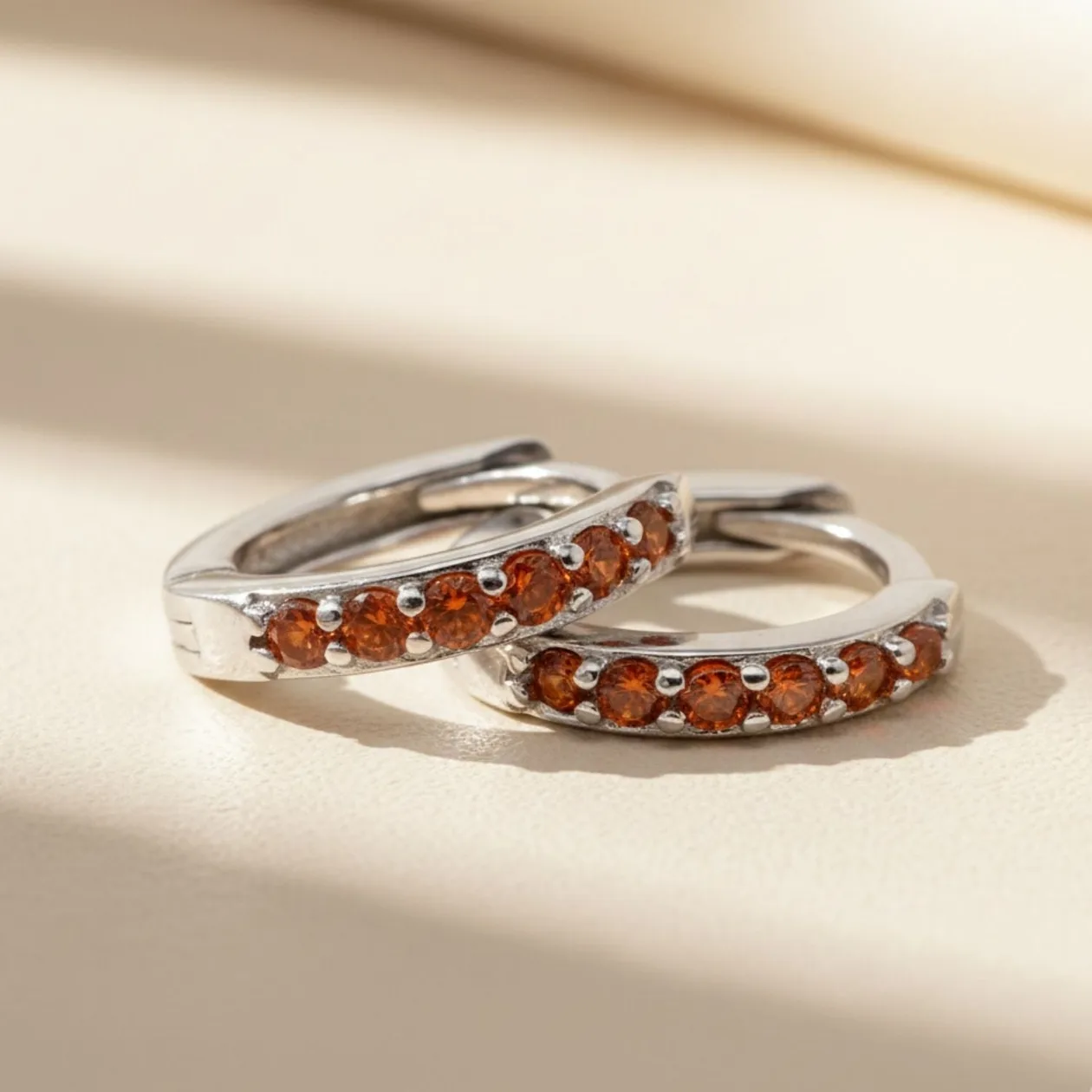 Garnet January Birthstone Small Silver Huggie Hoops: the shop's own photo