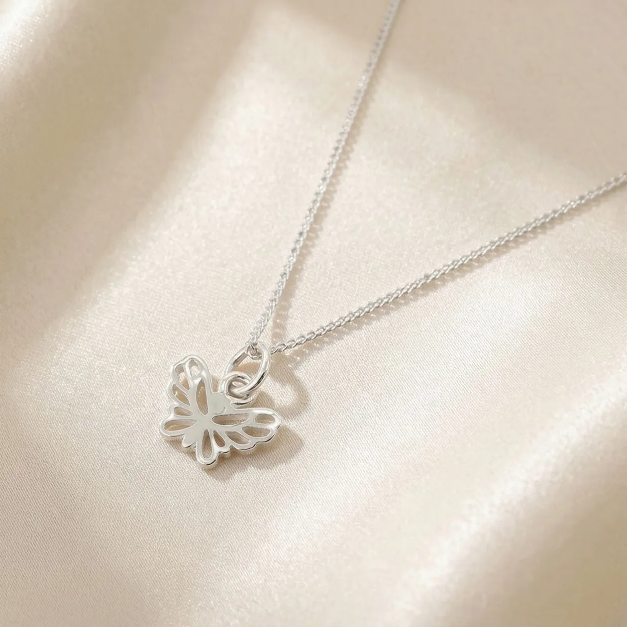 Dainty Butterfly Charm Sterling Silver Necklace: the shop's own photo