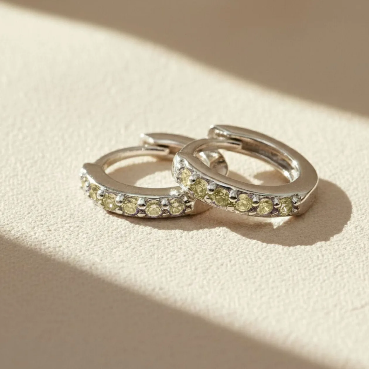 Peridot August Birthstone Small Silver Huggie Hoops: the shop's own photo