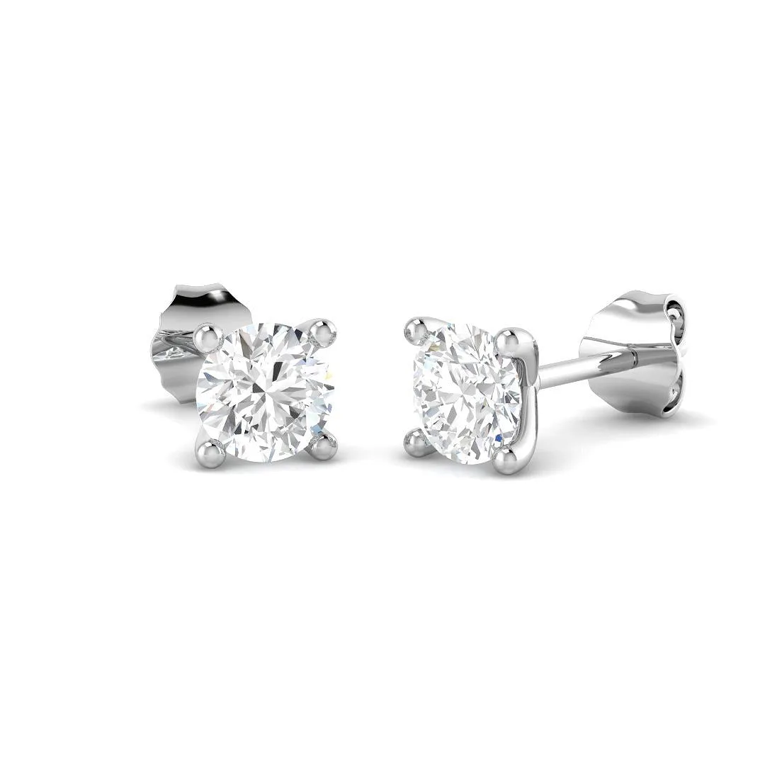 Stud Earrings with Round Brilliant Cut Diamonds - DE/VVS - Gold & Platinum - 9k Yellow Gold / 0.75 Carat: the shop's own photo