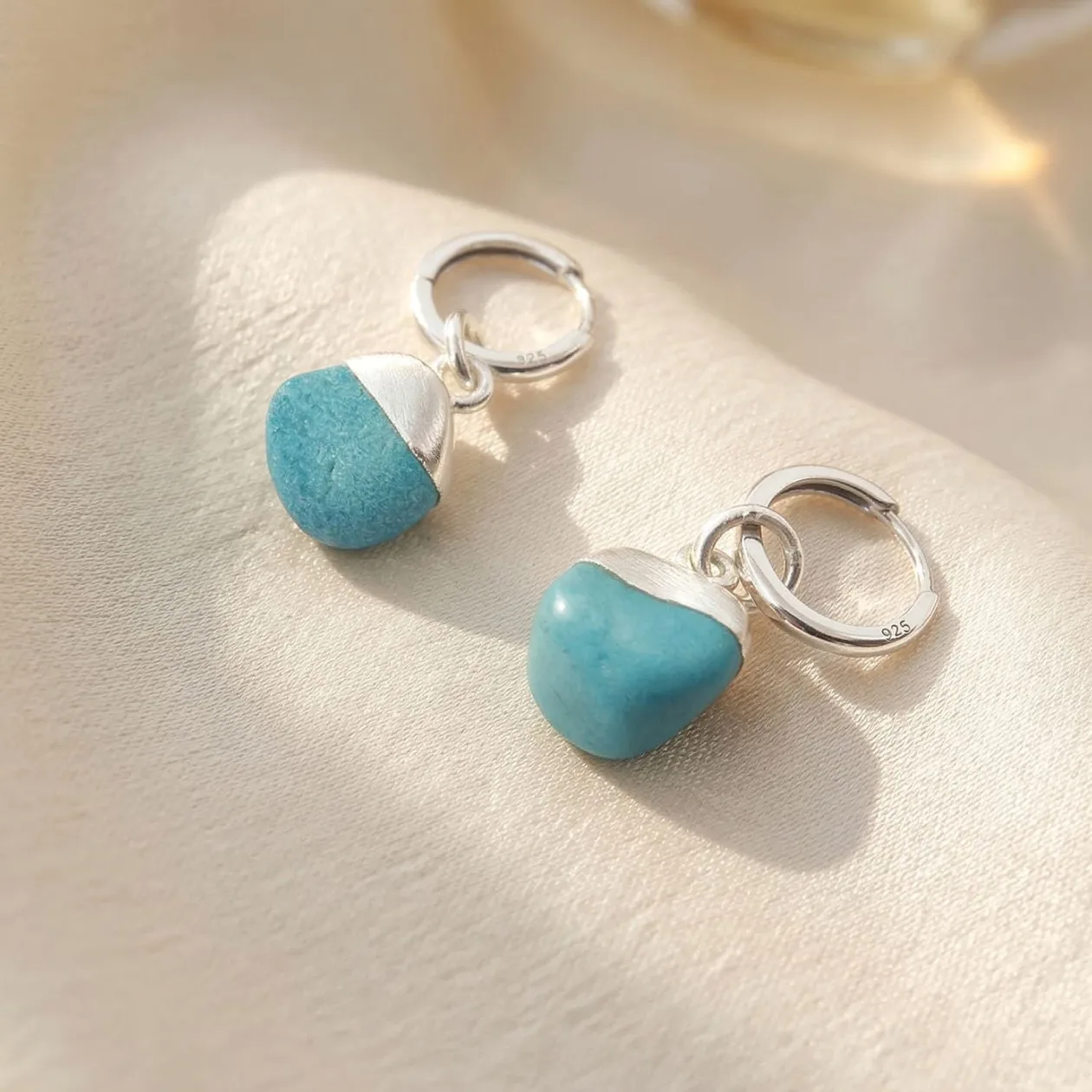 Raw Turquoise December Birthstone Silver Huggies: the shop's own photo