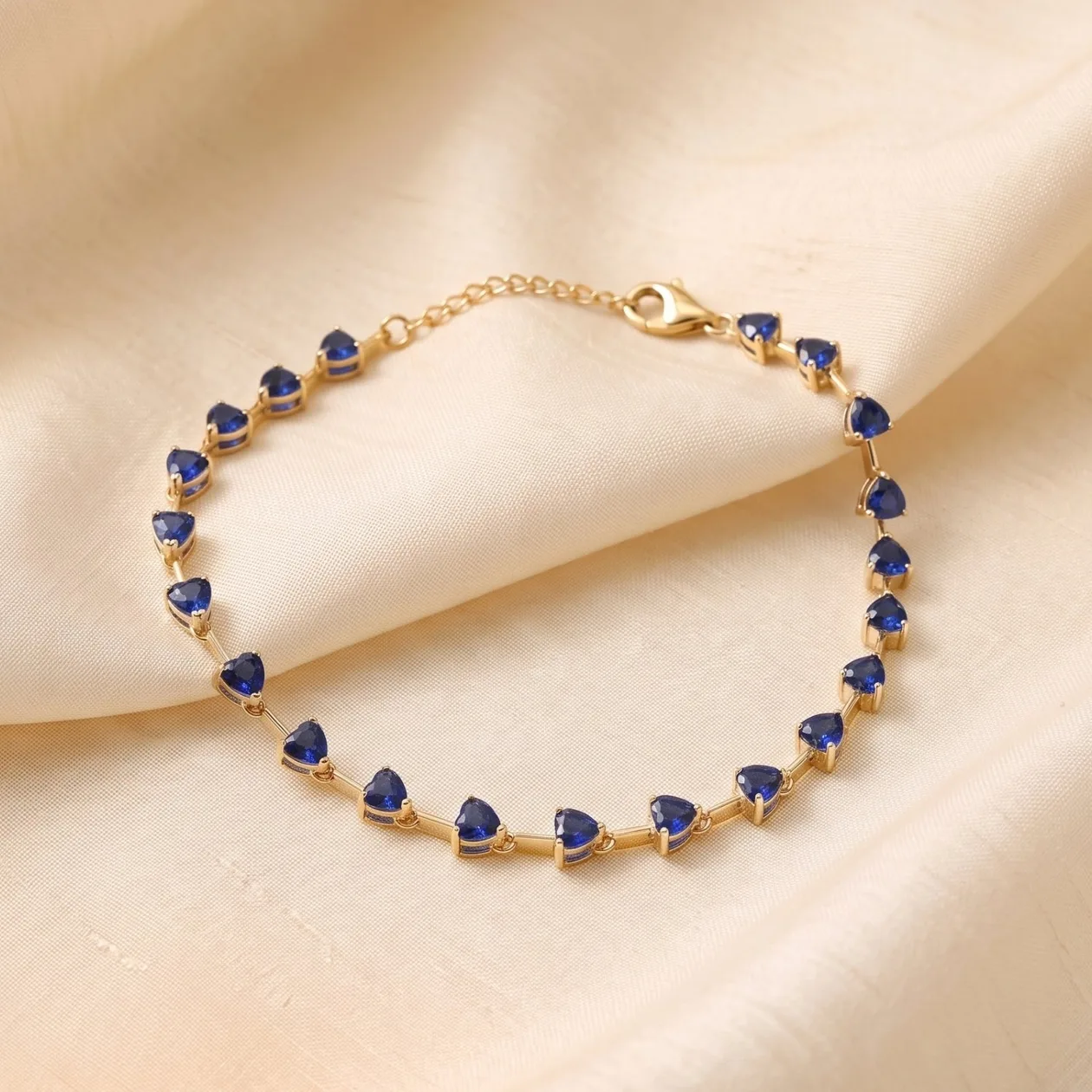 18ct Gold Plated Sapphire September Birthstone Heart Tennis Bracelet: the shop's own photo