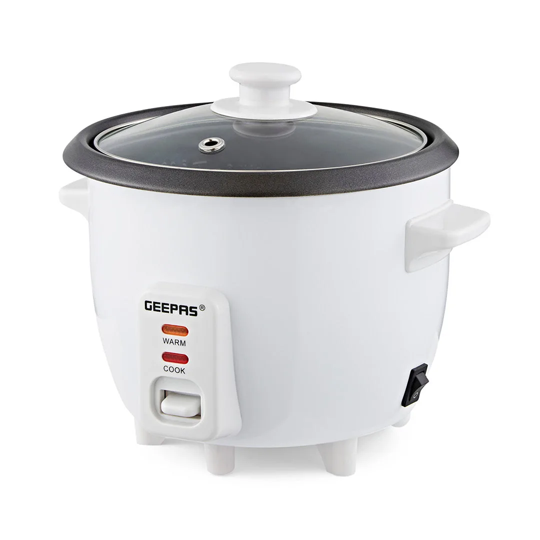 0.6L White Non-Stick Electric Rice Cooker With Cup & Spatula: the shop's own photo