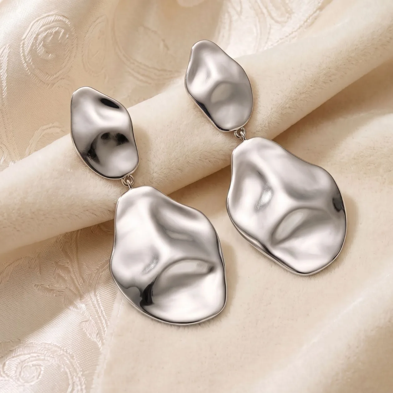Silver Hammered Teardrop Dangle Earrings: the shop's own photo
