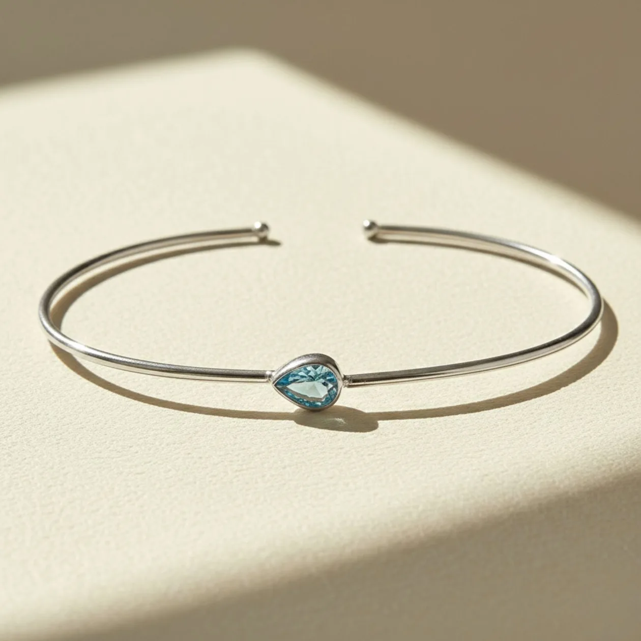 Minimalist Sterling Silver Aquamarine March Birthstone Bangle Bracelet: the shop's own photo
