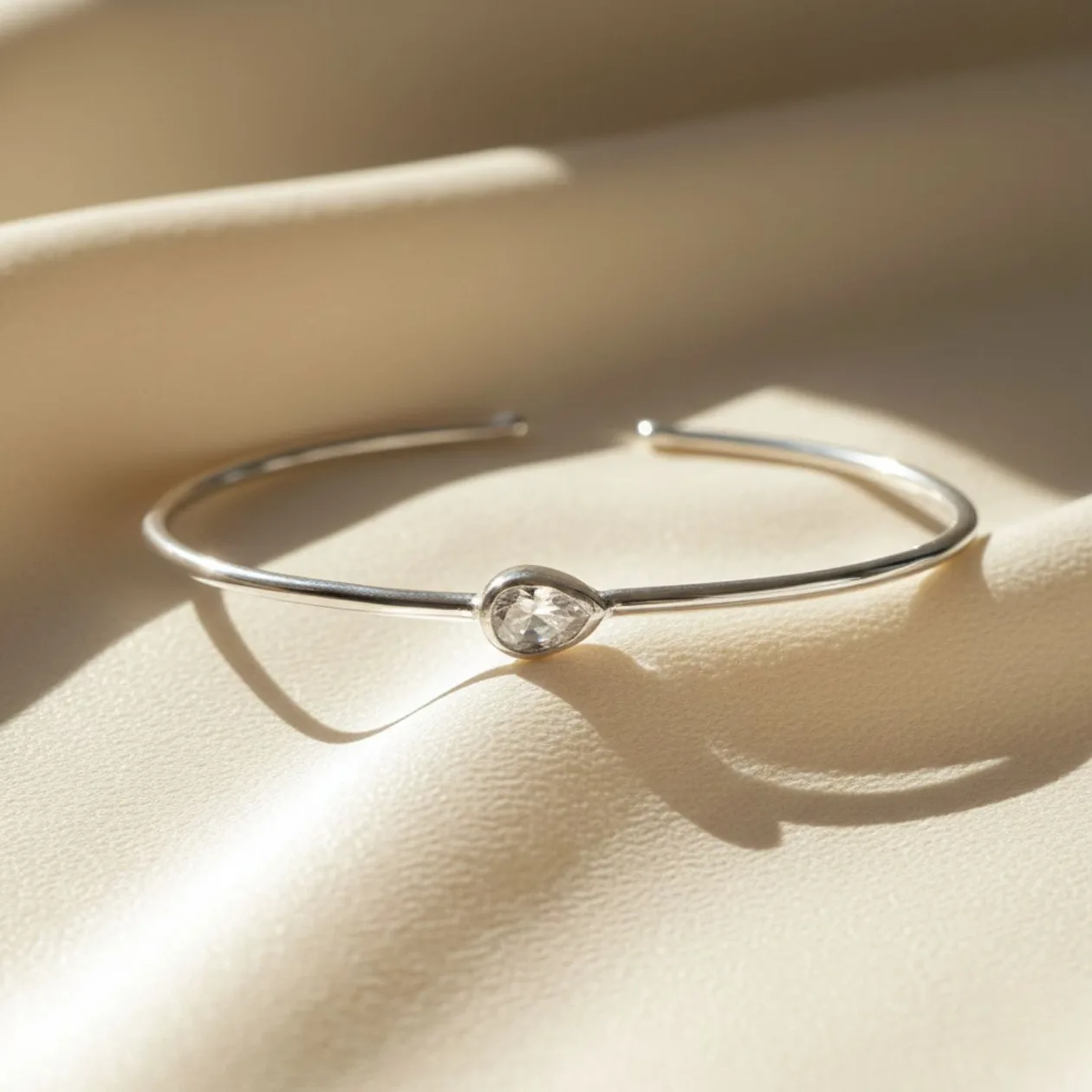 Minimalist Sterling Silver White Topaz April Birthstone Bangle Bracelet: the shop's own photo