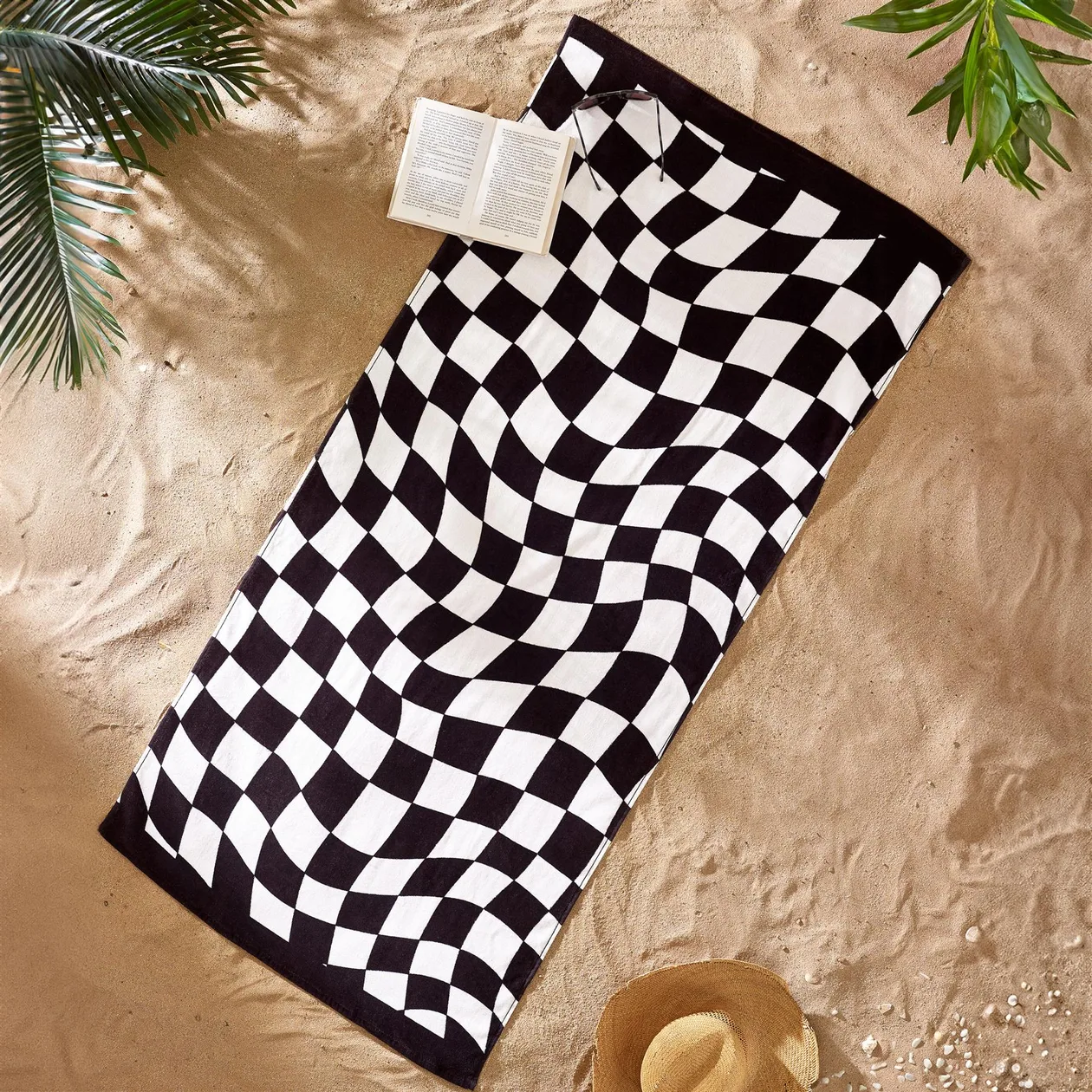 Catherine Lansfield Checkerboard Beach Towel: the shop's own photo