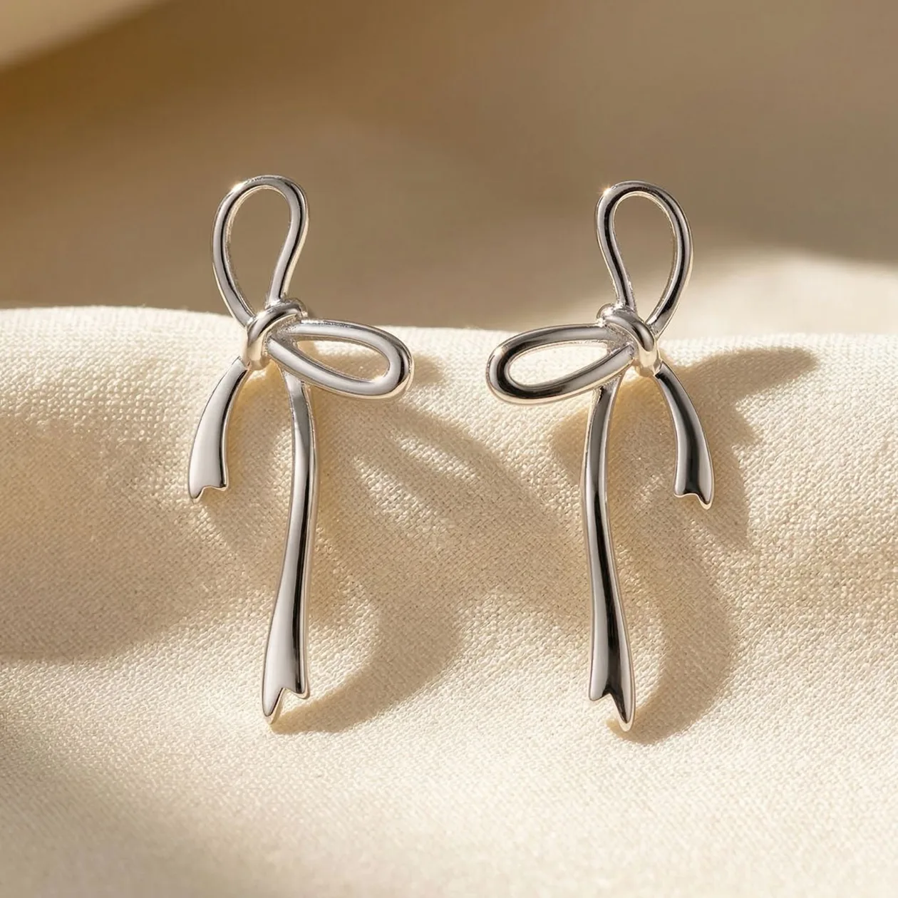 Sterling Silver Bow Tie Tassel Wedding Stud Earrings: the shop's own photo
