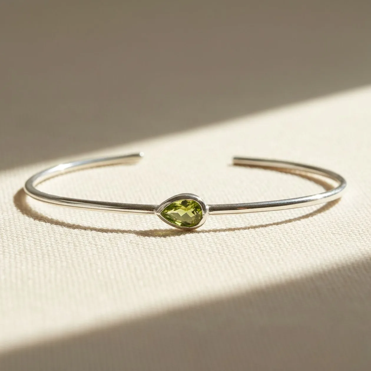 Minimalist Sterling Silver Peridot August Birthstone Bangle Bracelet: the shop's own photo